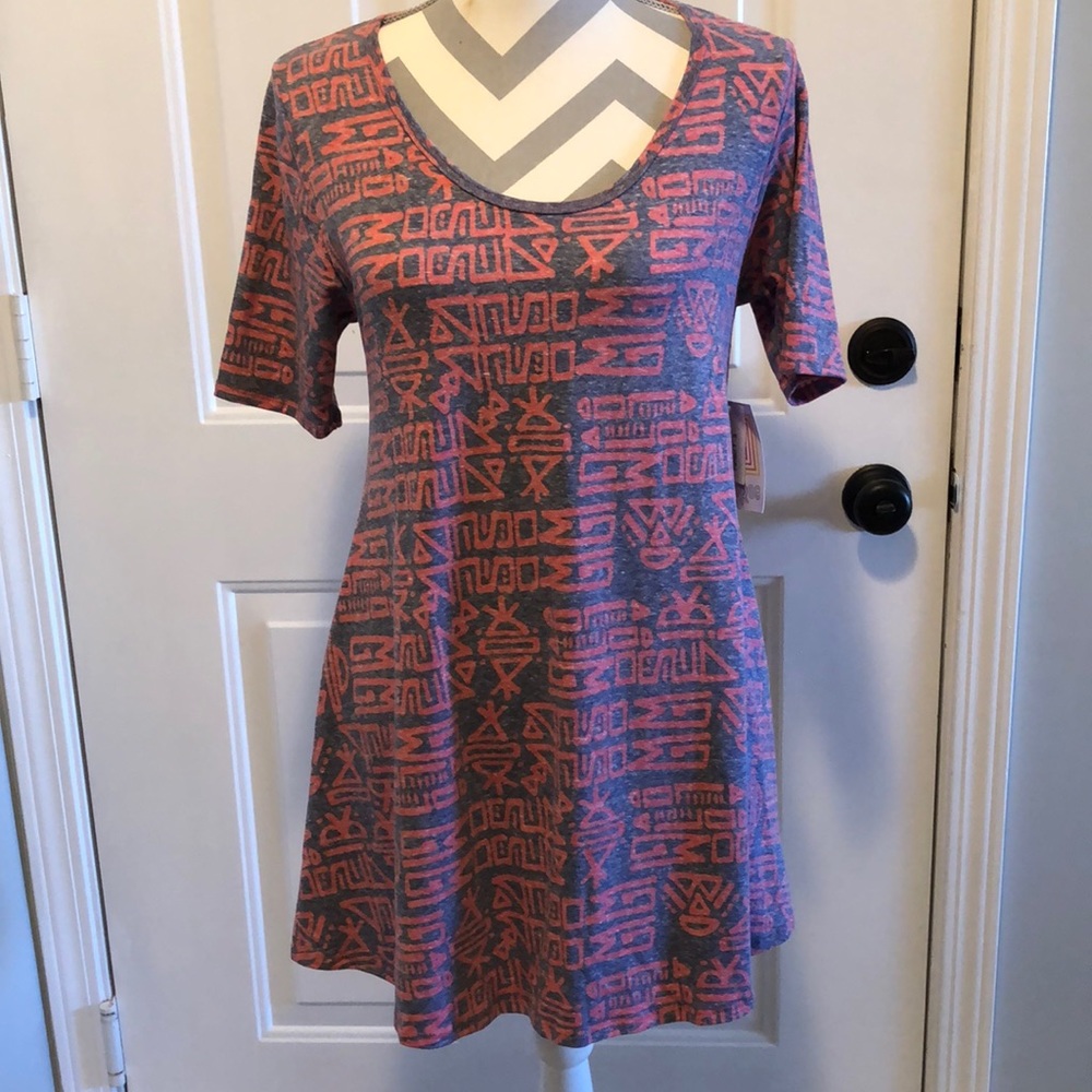 LulaRoe tunic perfect T print short sleeve scoop neck slit on the bottom side.